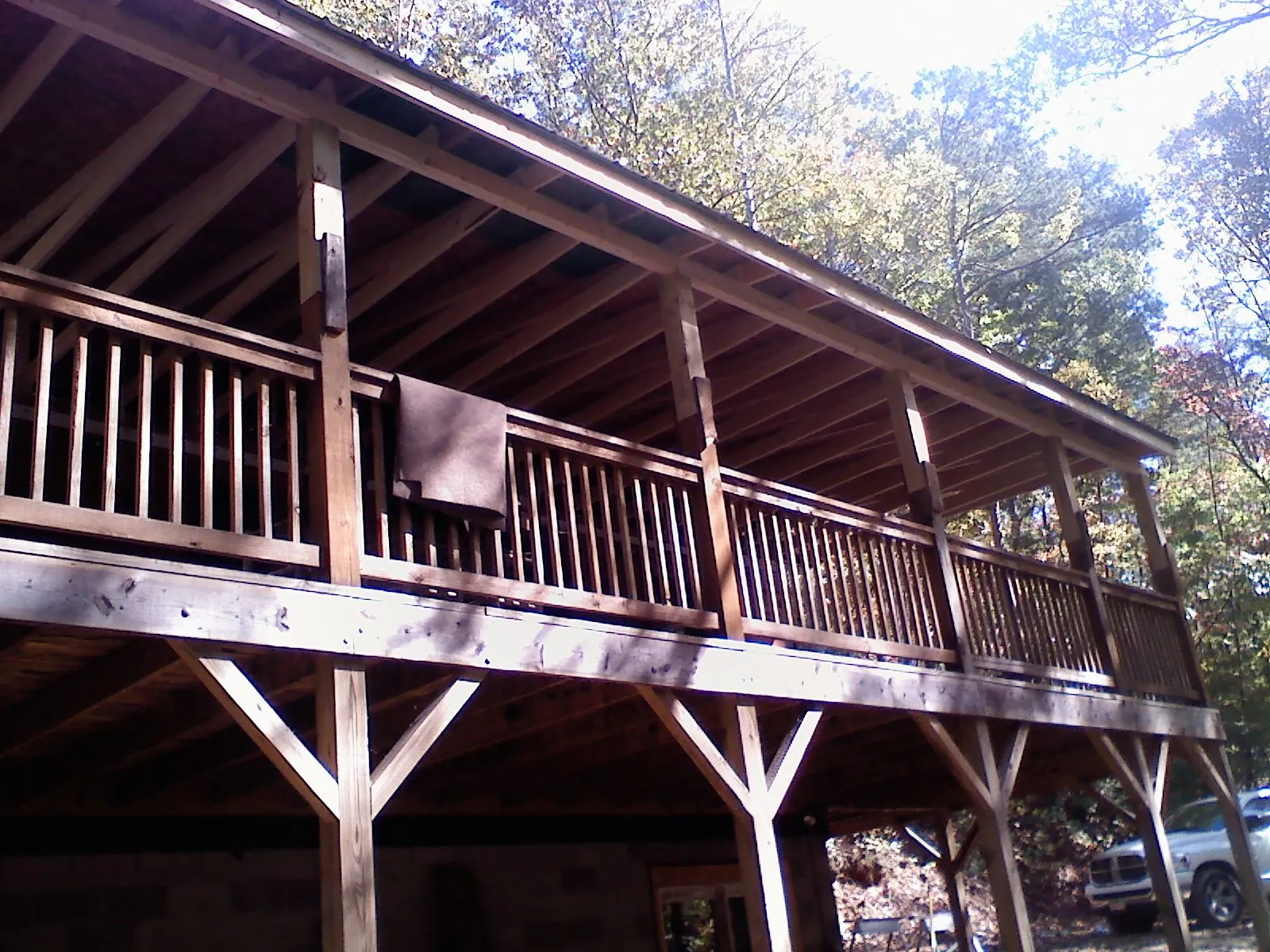 Timber framing under a new elevated porch and deck — Roof Leak Repair in Mequon by Roofing Brothers
